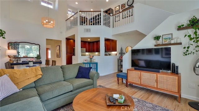 28653 Bar Hbr, Temecula, CA 92591 - living room featuring light wood finished floors and a high ceiling