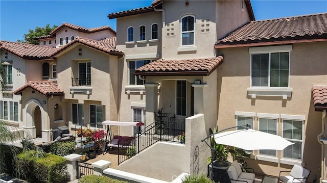 28653 Bar Hbr, Temecula, CA 92591 - rear view of house featuring a tile roof and stucco siding