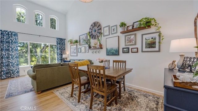 28653 Bar Hbr, Temecula, CA 92591 - dining area featuring wood finished floors and high vaulted ceiling