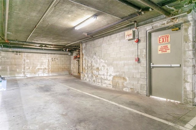 16940 Chatsworth St Unit 208, Granada Hills, CA 91344 - parking garage featuring concrete block wall