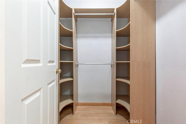 16940 Chatsworth St Unit 208, Granada Hills, CA 91344 - spacious closet featuring wood finished floors
