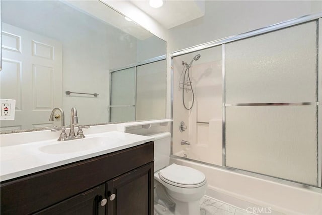 16940 Chatsworth St Unit 208, Granada Hills, CA 91344 - bathroom featuring marble finish floors, vanity, and combined bath / shower with glass door