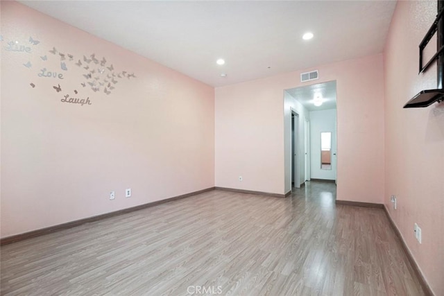 16940 Chatsworth St Unit 208, Granada Hills, CA 91344 - empty room featuring wood finished floors and recessed lighting