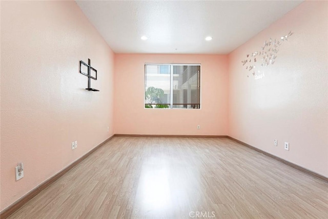 16940 Chatsworth St Unit 208, Granada Hills, CA 91344 - empty room with wood finished floors and recessed lighting