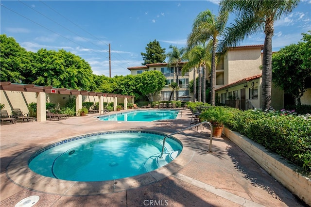 12720 Burbank Blvd Unit 121, Valley Village, CA 91607 - community pool with a hot tub and a patio