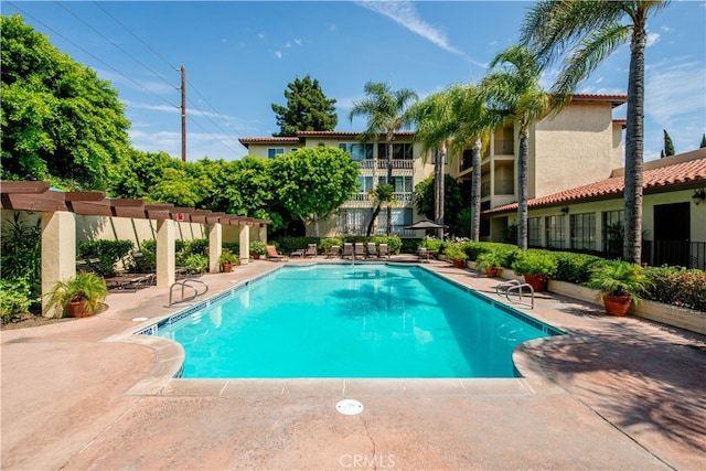 12720 Burbank Blvd Unit 121, Valley Village, CA 91607 - community pool featuring a patio area