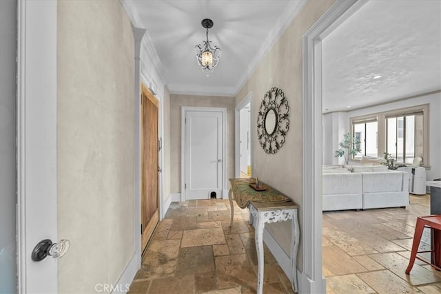 315 W 3rd St Unit 301, Long Beach, CA 90802 - corridor with stone tile floors, crown molding, and a chandelier