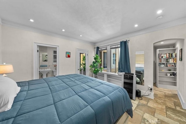 315 W 3rd St Unit 301, Long Beach, CA 90802 - bedroom featuring crown molding, stone tile floors, recessed lighting, and ensuite bathroom