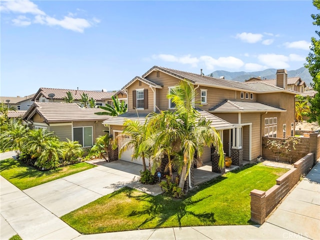 11209 Pinecone St, Corona, CA 92883 - view of front of property with driveway, an attached garage, and a mountain view