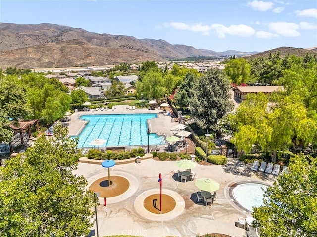 11209 Pinecone St, Corona, CA 92883 - community pool with a mountain view and a patio area