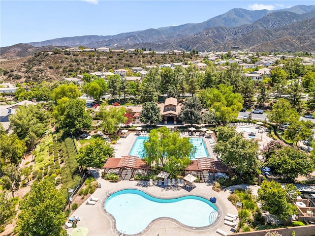 11209 Pinecone St, Corona, CA 92883 - aerial view of residential area featuring a pool and a mountain backdrop