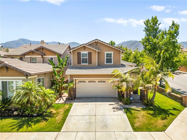11209 Pinecone St, Corona, CA 92883 - view of front of home featuring an attached garage, driveway, a mountain view, a front yard, and a tile roof