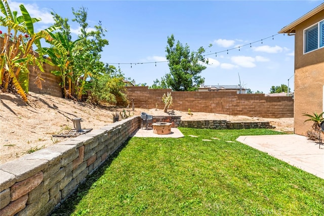 11209 Pinecone St, Corona, CA 92883 - fenced backyard featuring an outdoor fire pit and a patio