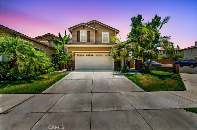 11209 Pinecone St, Corona, CA 92883 - traditional home featuring brick siding, a garage, concrete driveway, and a front yard