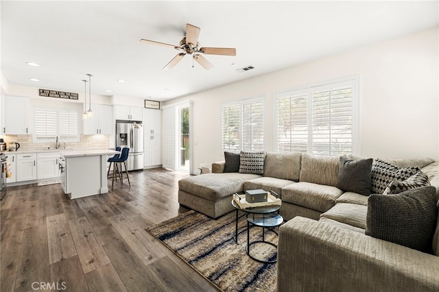 11209 Pinecone St, Corona, CA 92883 - living room with wood finished floors, ceiling fan, and recessed lighting