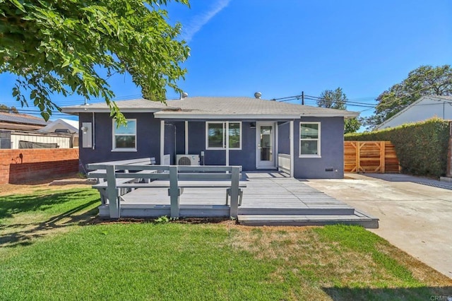 8450 Dallas St, La Mesa, CA 91942 - rear view of property featuring a wooden deck, a shingled roof, and stucco siding