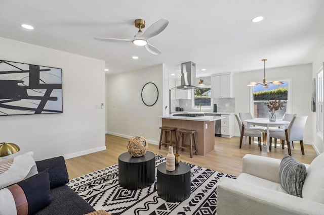8450 Dallas St, La Mesa, CA 91942 - living area featuring light wood-style flooring, ceiling fan, and recessed lighting