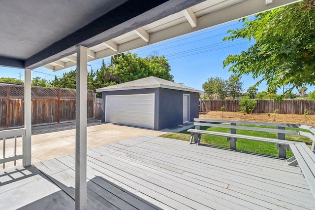 8450 Dallas St, La Mesa, CA 91942 - wooden deck with an outdoor structure, a detached garage, and a fenced backyard