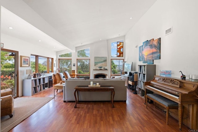 764 E Solana Cir, Solana Beach, CA 92075 - living area featuring plenty of natural light, a fireplace, wood finished floors, recessed lighting, and a towering ceiling
