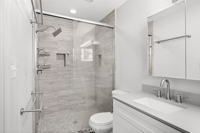 571 Redwood Way, Chico, CA 95926 - bathroom with a stall shower, vanity, and recessed lighting