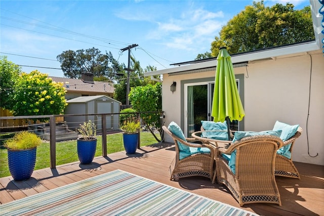 571 Redwood Way, Chico, CA 95926 - wooden deck with a storage unit and outdoor dining area