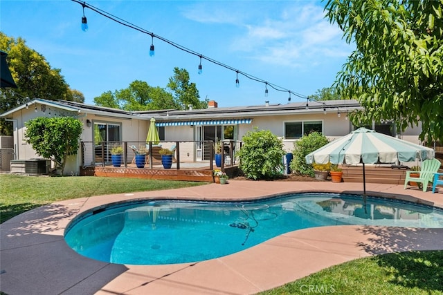571 Redwood Way, Chico, CA 95926 - swimming pool featuring a wooden deck, a yard, and a patio area