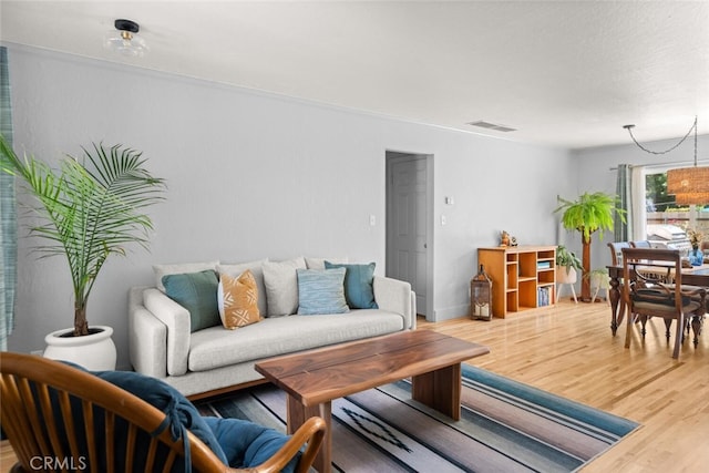 571 Redwood Way, Chico, CA 95926 - living area featuring wood finished floors and baseboards
