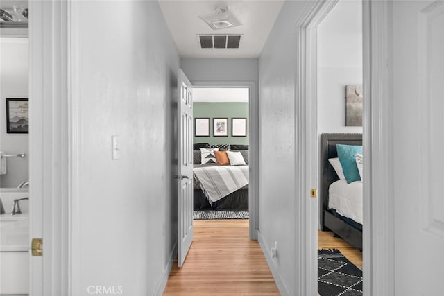 571 Redwood Way, Chico, CA 95926 - corridor with light wood-type flooring and baseboards