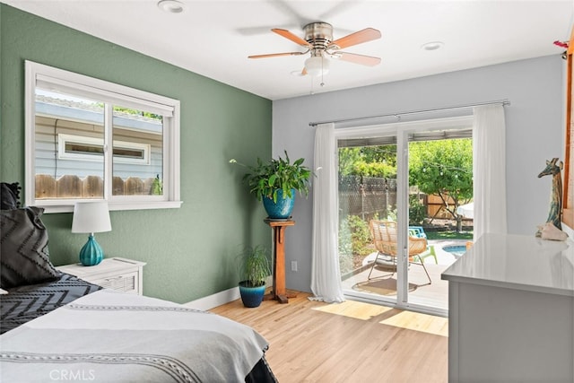 571 Redwood Way, Chico, CA 95926 - bedroom with access to exterior, wood finished floors, and a ceiling fan