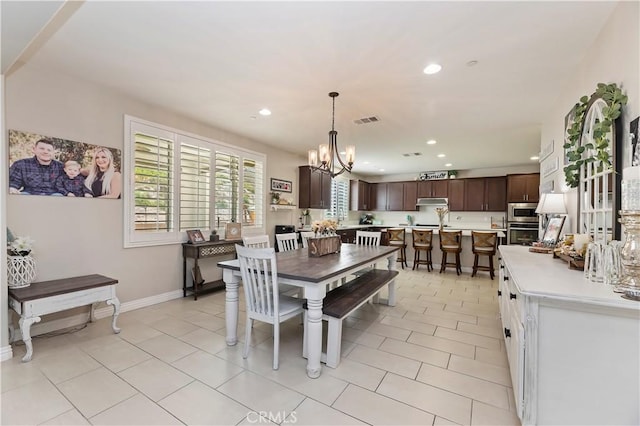 9574 Alta Cresta Ave, Riverside, CA 92508 - dining room featuring a chandelier, recessed lighting, and light tile patterned floors