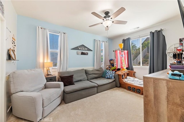 9574 Alta Cresta Ave, Riverside, CA 92508 - carpeted living area featuring a ceiling fan