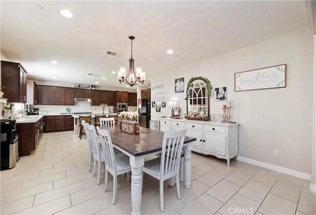 9574 Alta Cresta Ave, Riverside, CA 92508 - dining room featuring a chandelier, recessed lighting, and light tile patterned floors