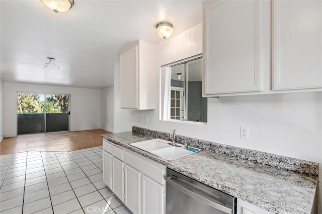 29788 Sea Shore Ln Unit 30, Laguna Niguel, CA 92677 - kitchen featuring stainless steel dishwasher, light tile patterned floors, white cabinets, and open floor plan