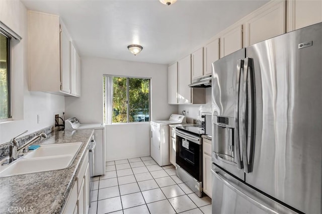 29788 Sea Shore Ln Unit 30, Laguna Niguel, CA 92677 - kitchen with appliances with stainless steel finishes, under cabinet range hood, light tile patterned floors, light countertops, and white cabinets