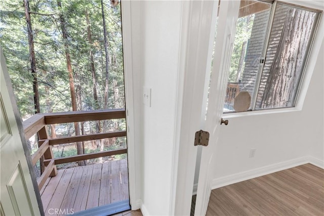 26188 Boulder Ln, Twin Peaks, CA 92391 - doorway featuring baseboards and wood finished floors