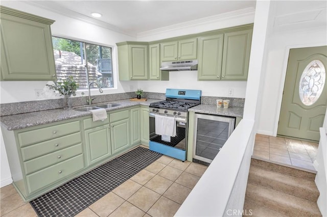 26188 Boulder Ln, Twin Peaks, CA 92391 - kitchen featuring under cabinet range hood, green cabinets, stainless steel gas range, beverage cooler, and light tile patterned floors
