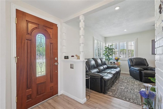 3126 E Merrygrove St, West Covina, CA 91792 - entryway featuring light wood-style flooring and recessed lighting