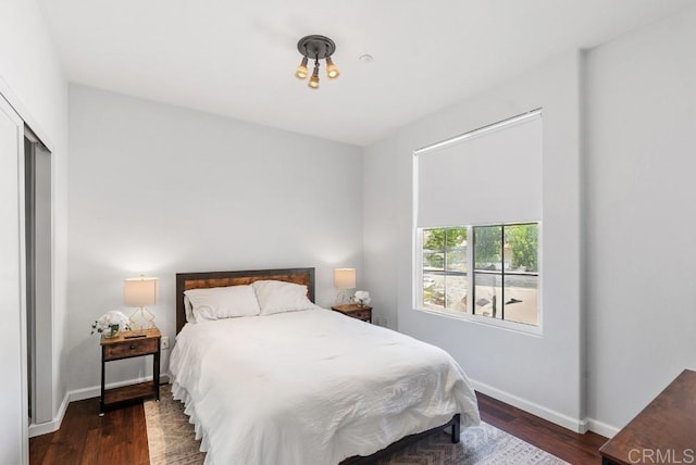 3131 Ferncreek Ln, Escondido, CA 92027 - bedroom featuring dark wood-style flooring and a closet