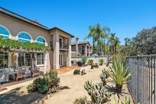 3131 Ferncreek Ln, Escondido, CA 92027 - view of yard featuring a balcony and a patio