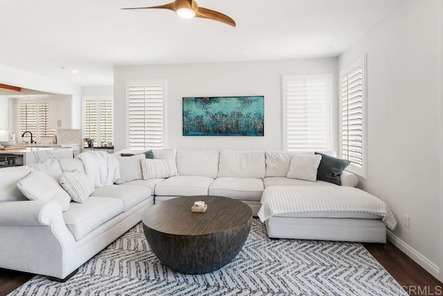 3131 Ferncreek Ln, Escondido, CA 92027 - living area with a ceiling fan and dark wood-style flooring