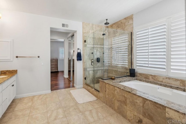 3131 Ferncreek Ln, Escondido, CA 92027 - bathroom featuring a stall shower, a bath, vanity, and tile patterned floors