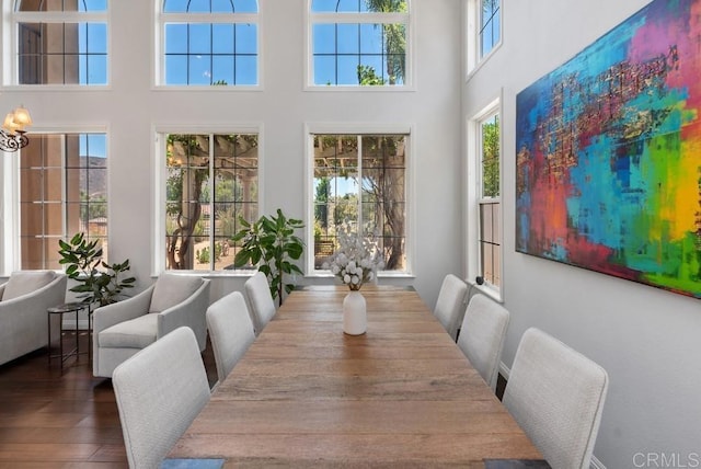 3131 Ferncreek Ln, Escondido, CA 92027 - dining area featuring a towering ceiling and wood finished floors