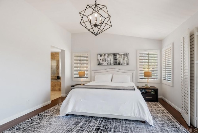 3131 Ferncreek Ln, Escondido, CA 92027 - bedroom featuring dark wood-style floors, a chandelier, lofted ceiling, and ensuite bath
