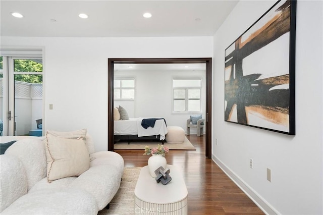 447 N Doheny Dr Unit 104, Beverly Hills, CA 90210 - living room featuring dark wood-style flooring and recessed lighting
