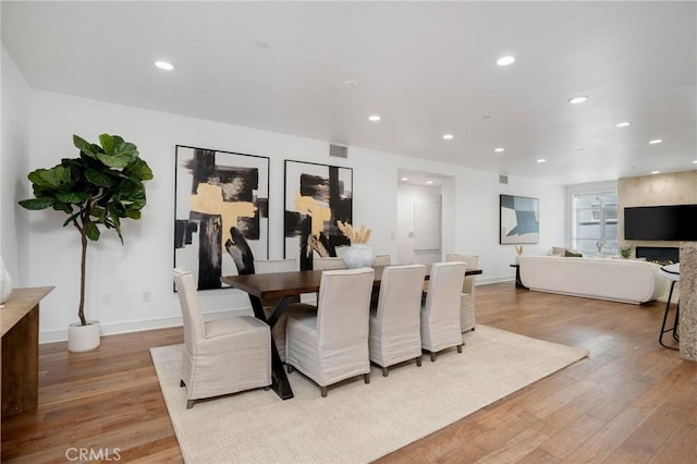 447 N Doheny Dr Unit 104, Beverly Hills, CA 90210 - dining room featuring recessed lighting and wood finished floors