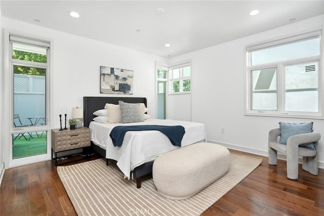447 N Doheny Dr Unit 104, Beverly Hills, CA 90210 - bedroom with multiple windows, dark wood-type flooring, and recessed lighting