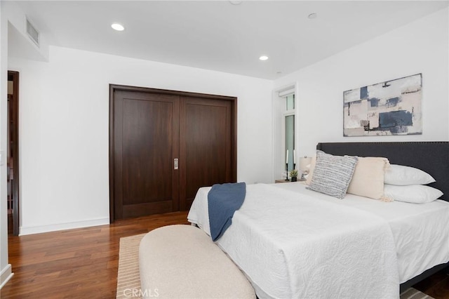 447 N Doheny Dr Unit 104, Beverly Hills, CA 90210 - bedroom featuring wood finished floors and recessed lighting