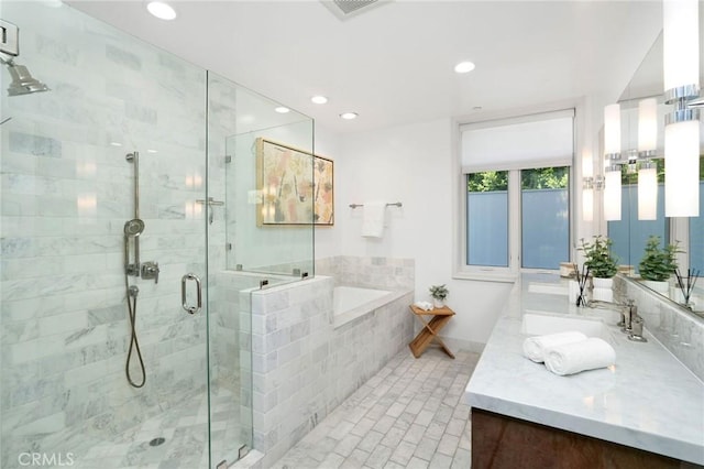 447 N Doheny Dr Unit 104, Beverly Hills, CA 90210 - bathroom with vanity, a bath, a shower stall, and recessed lighting