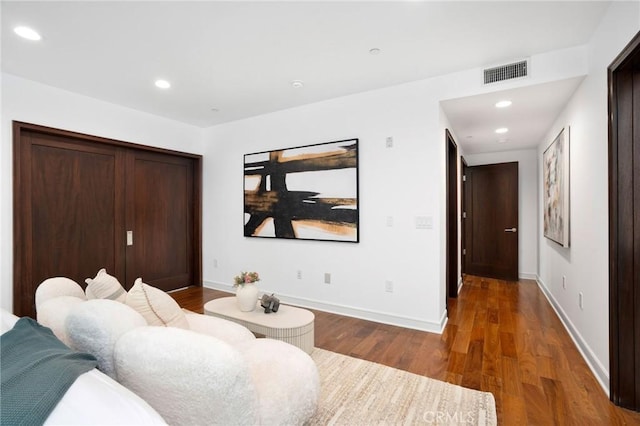 447 N Doheny Dr Unit 104, Beverly Hills, CA 90210 - living room featuring wood finished floors and recessed lighting