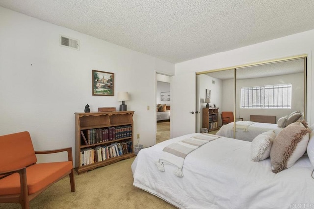 5420 Mirar Ct, Bonita, CA 91902 - bedroom featuring carpet, a closet, and a textured ceiling